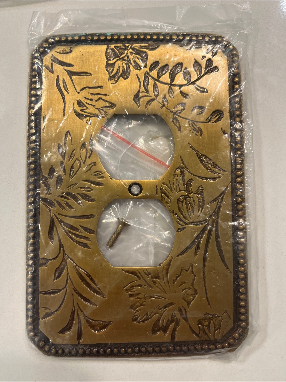 Anthropologie Embossed Floral Brass Outlet Cover